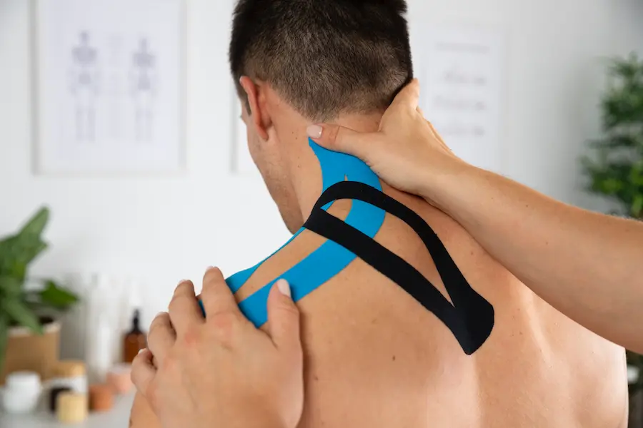 vendaje neuromuscular Madrid hombre espalda